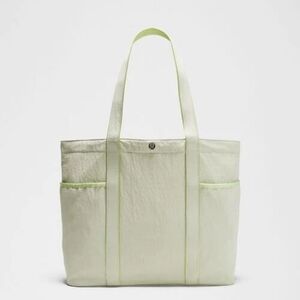 Lululemon Daily Multi-Pocket Tote Bag 20L in the color combination Honeydew/Sour